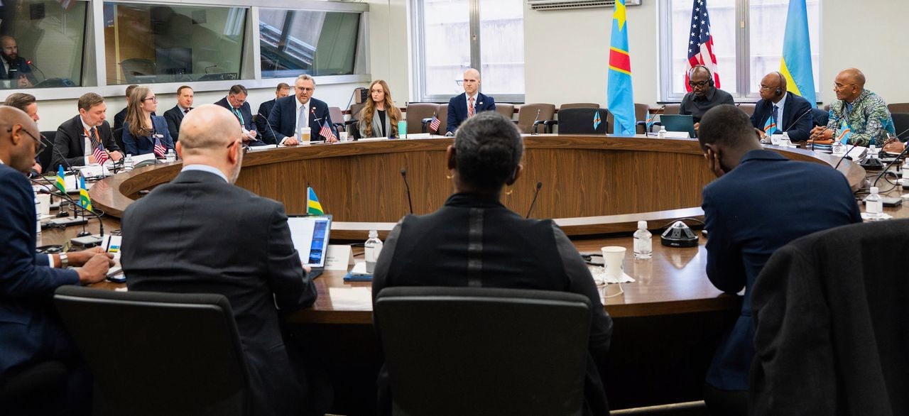 One can see the Congolese and the American negotiators - their faces, the Rwandan delegation is all from their backs.