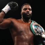 Lawrence Okolie shows off his belt