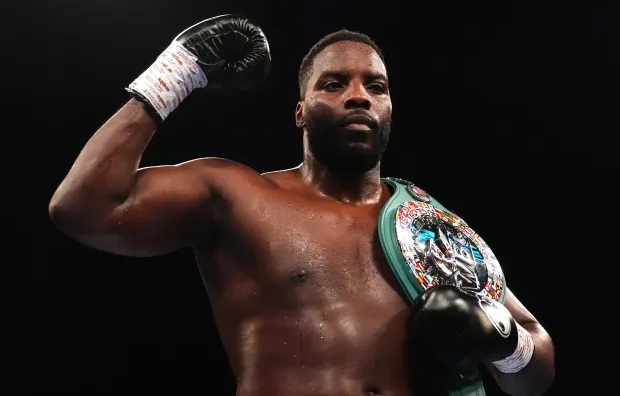 Lawrence Okolie shows off his belt